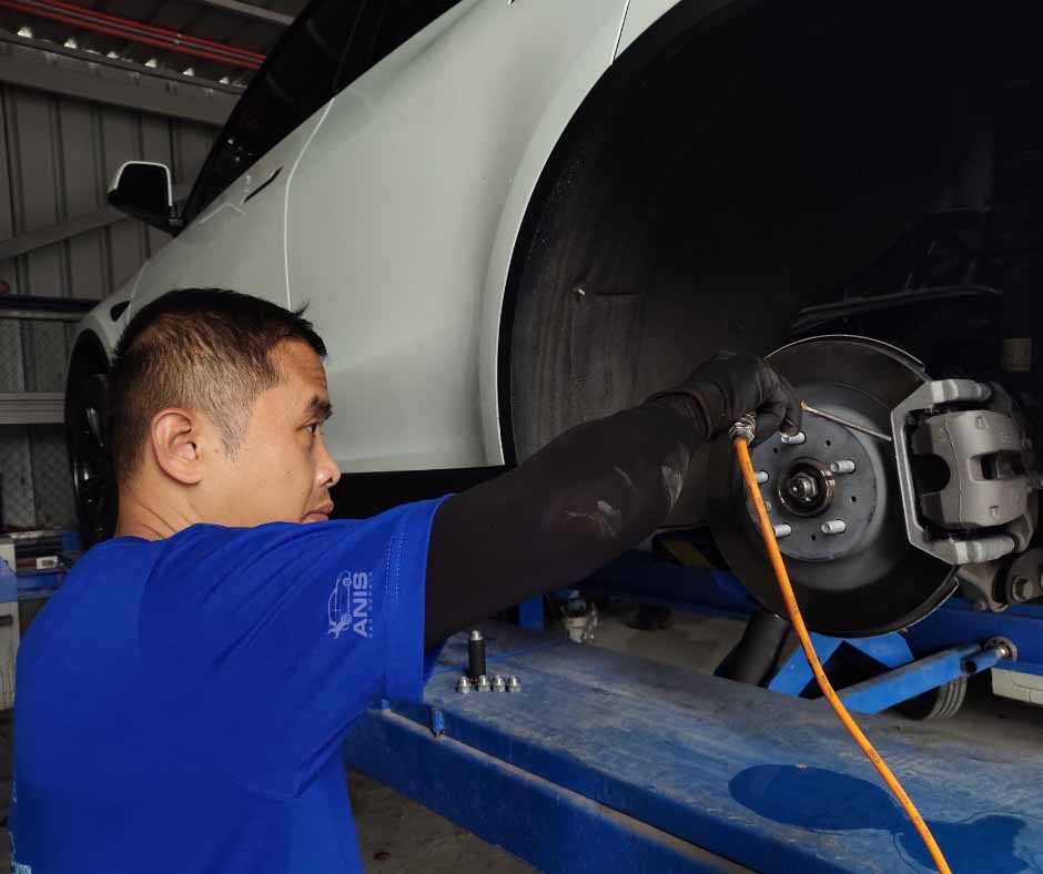Anis Car Repair Shop Mechanic performing a Rust Repair work in Manila Philippines