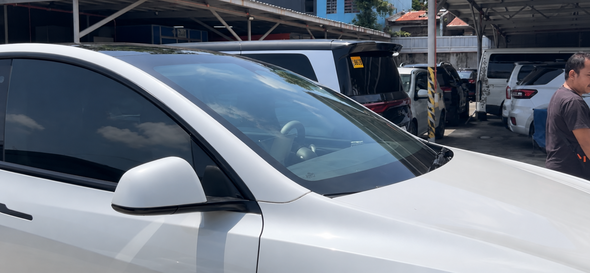 Tesla Model Y windshield replacement after repair